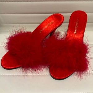 New, never used hot red slip on shoes. Size 8.